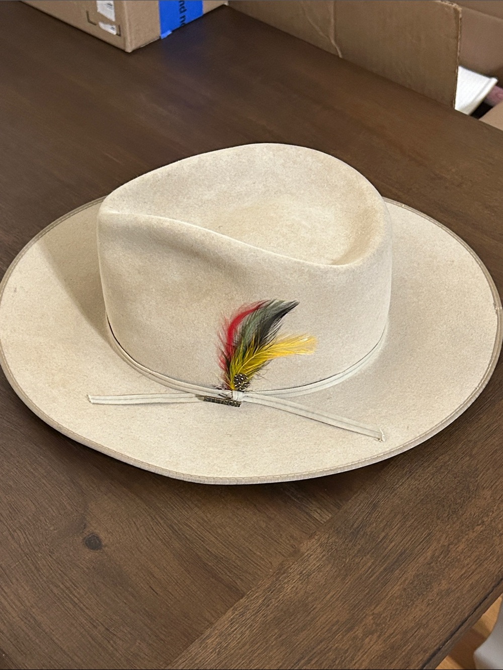 Stetson Dune 5X Gun Club hat with Red, Black and Yellow Feather and pin.